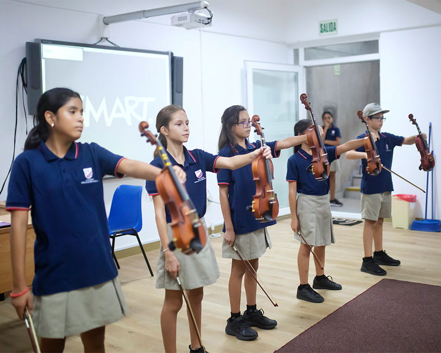 Students showing their violins